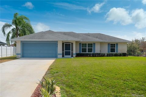 Photo of 414 SW Carter Avenue, Port Saint Lucie, FL 34983 (MLS # M20054386)