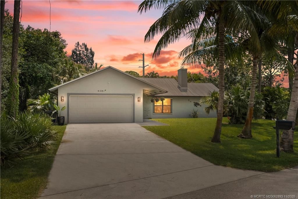 Photo of 6361 SE Phillips Bend Avenue, Stuart, FL 34997 (MLS # M20052893)