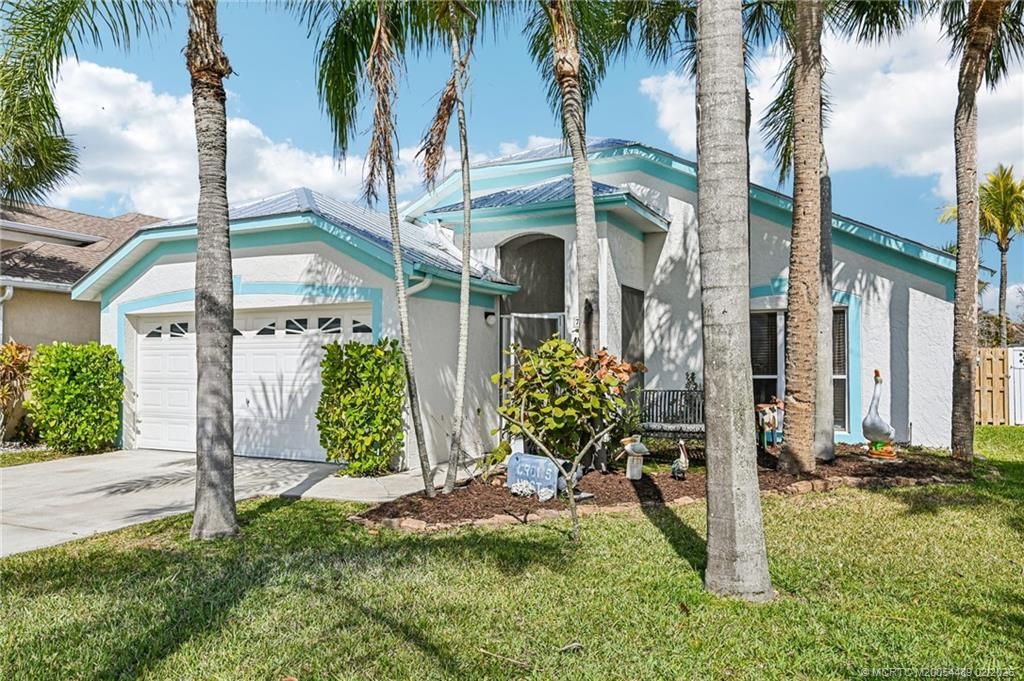 Photo of 713 NW Waterlily Place, Jensen Beach, FL 34957 (MLS # M20054489)