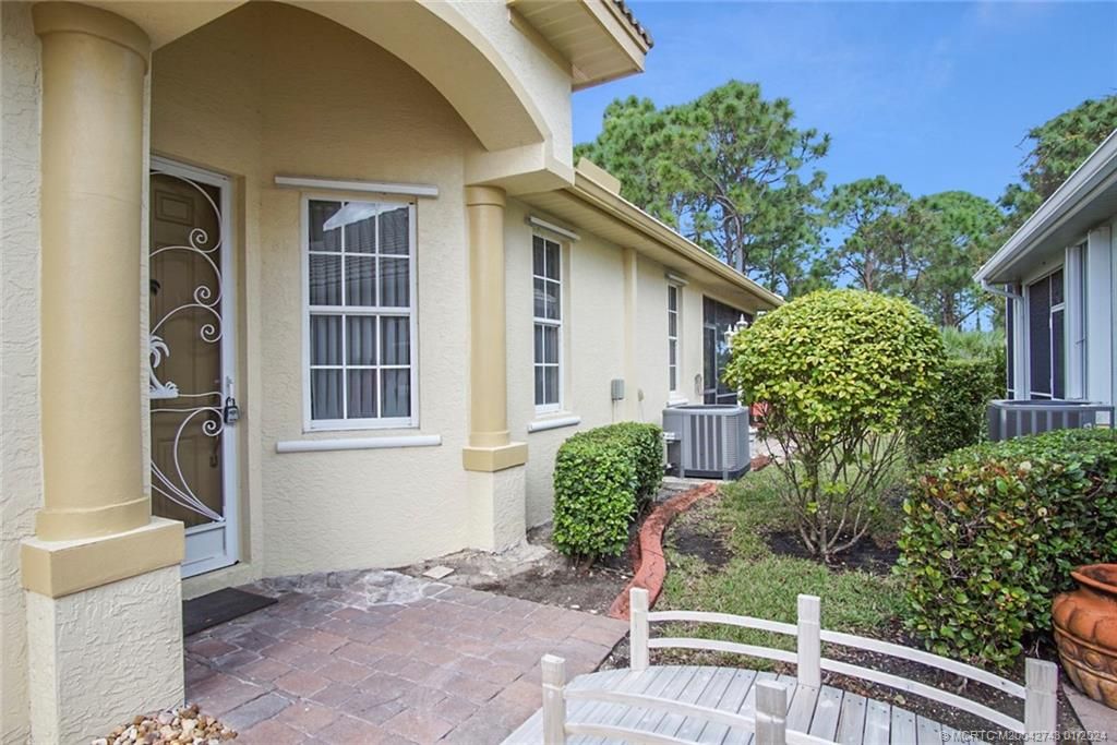 Photo of 861 NW Red Pine Way, Jensen Beach, FL 34957 (MLS # M20042743)