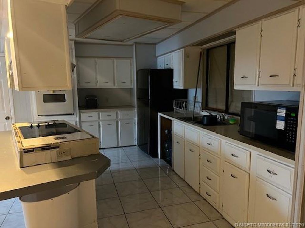 Photo of 2555 PGA Boulevard #371, Palm Beach Gardens, FL 33410 (MLS # M20053878)