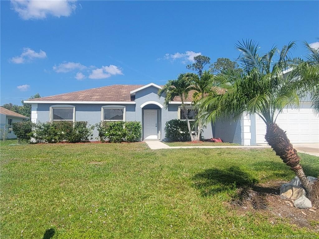 Photo of 1841 SW Starman Avenue, Port Saint Lucie, FL 34953 (MLS # M20049387)