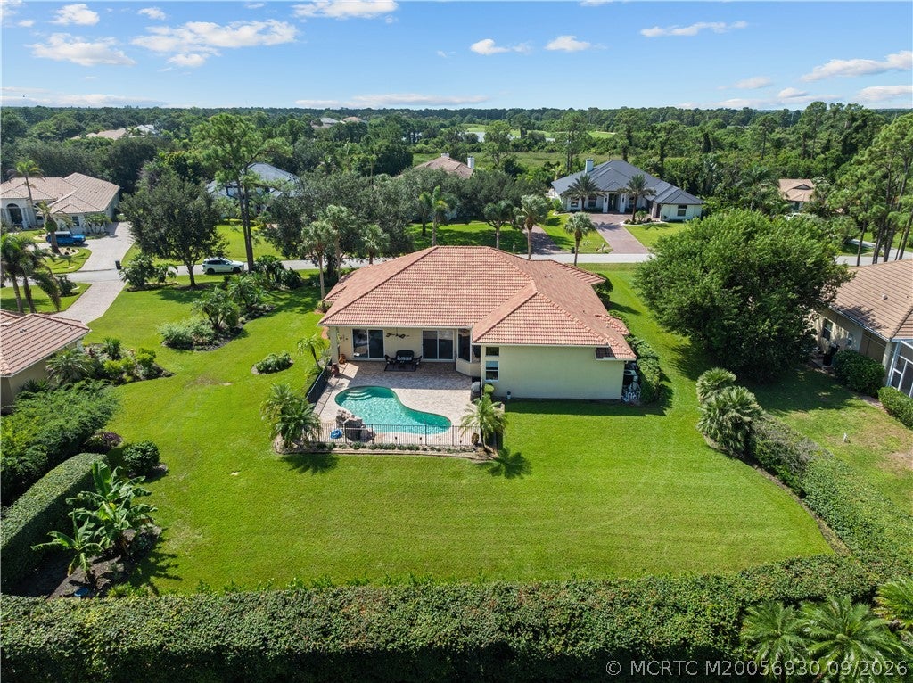 Photo of 10423 SW Fiddlers Way, Palm City, FL 34990 (MLS # M20056930)