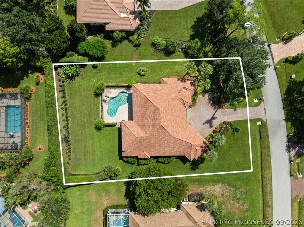 Photo of 10423 SW Fiddlers Way, Palm City, FL 34990 (MLS # M20056930)