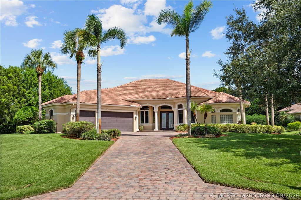 Photo of 10423 SW Fiddlers Way, Palm City, FL 34990 (MLS # M20056930)