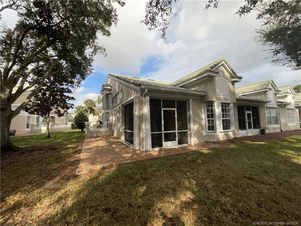 Photo of 1581 SW Harbour Isles Circle, Port Saint Lucie, FL 34986 (MLS # M20054001)