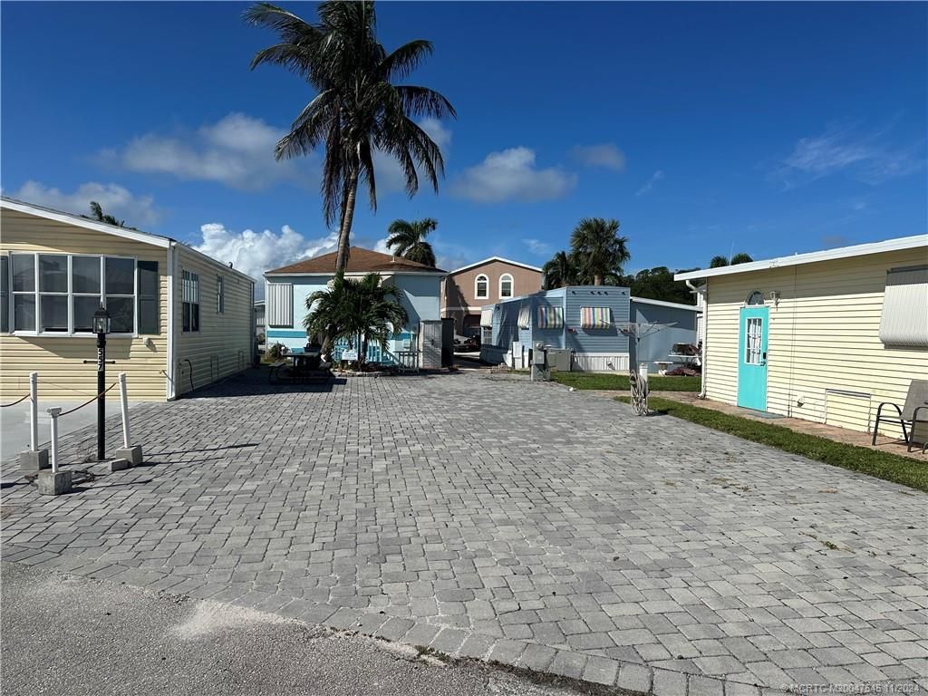 Photo of 557 Nettles Boulevard, Jensen Beach, FL 34957 (MLS # M20047545)