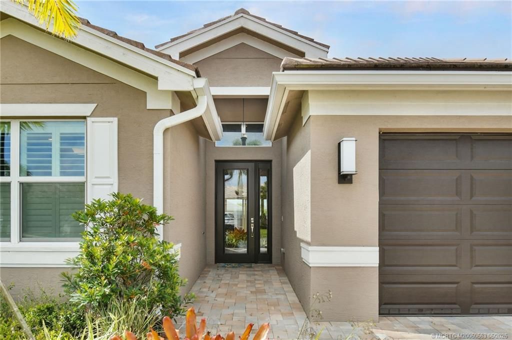 Photo of 11933 SW Coral Cove Parkway, Port Saint Lucie, FL 34987 (MLS # M20050563)