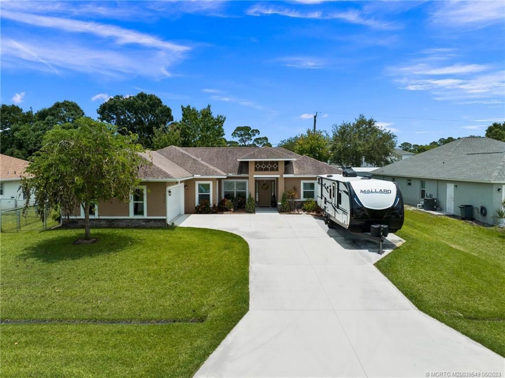 Photo of 4117 SW Darien Street, Port Saint Lucie, FL 34953 (MLS # M20039549)