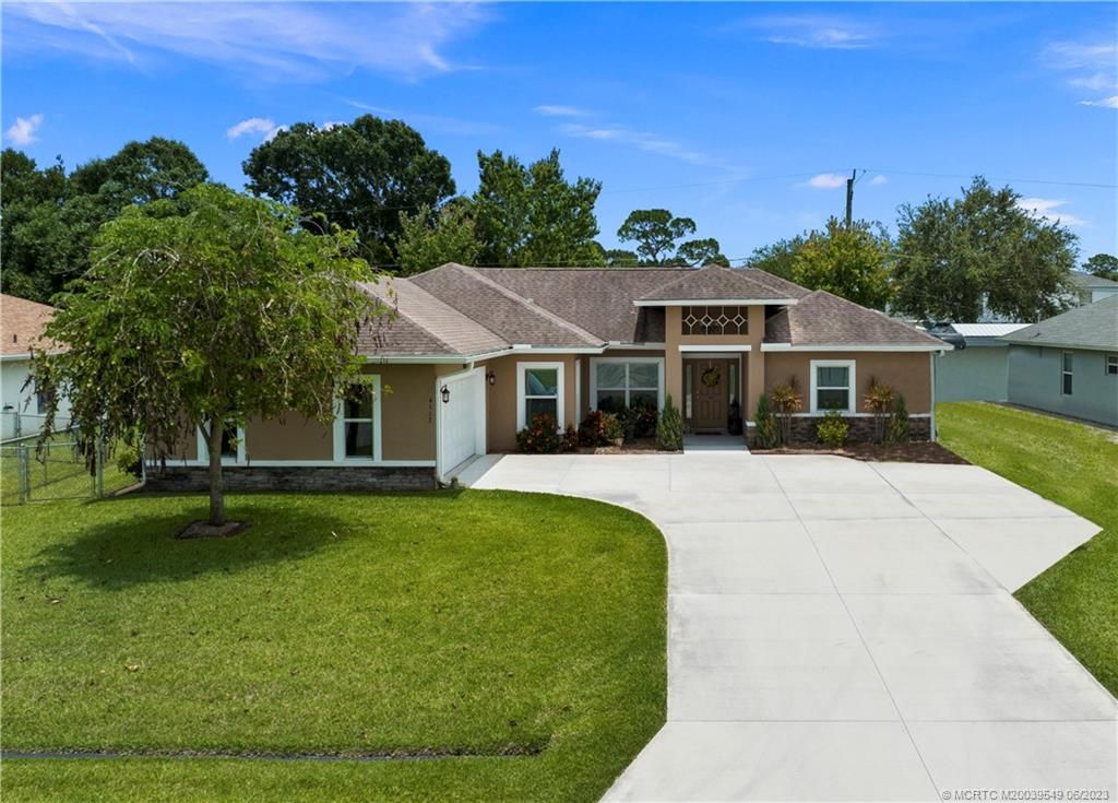 Photo of 4117 SW Darien Street, Port Saint Lucie, FL 34953 (MLS # M20039549)