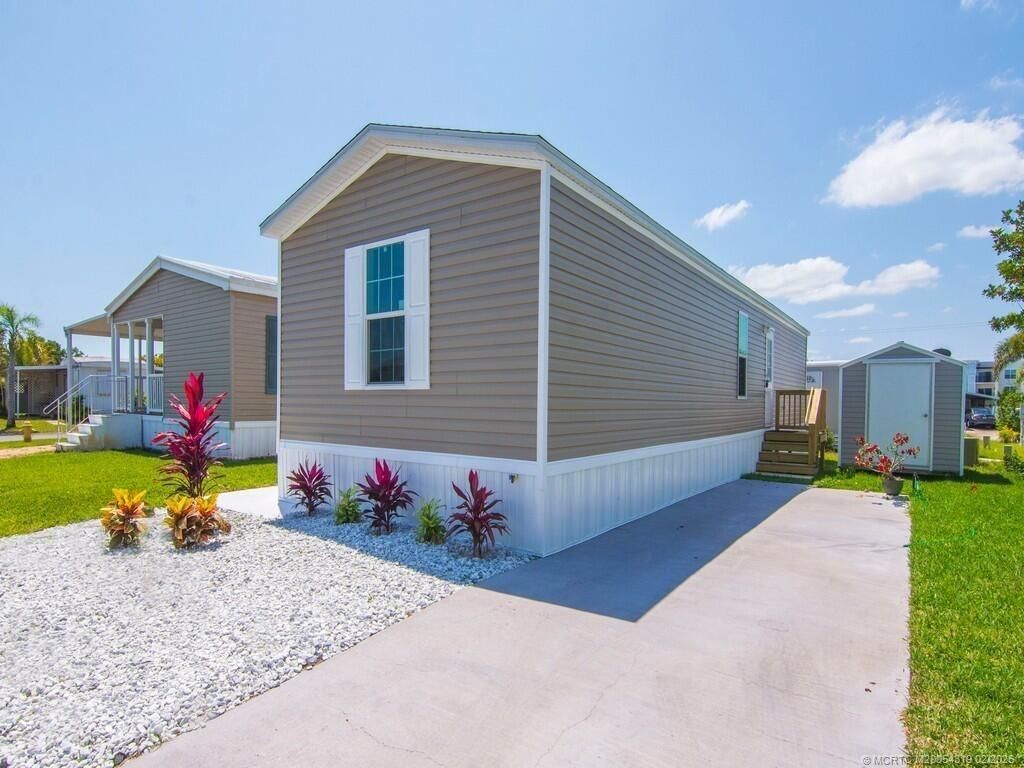 Photo of 315 NE Cardinal Lane, Jensen Beach, FL 34957 (MLS # M20054319)