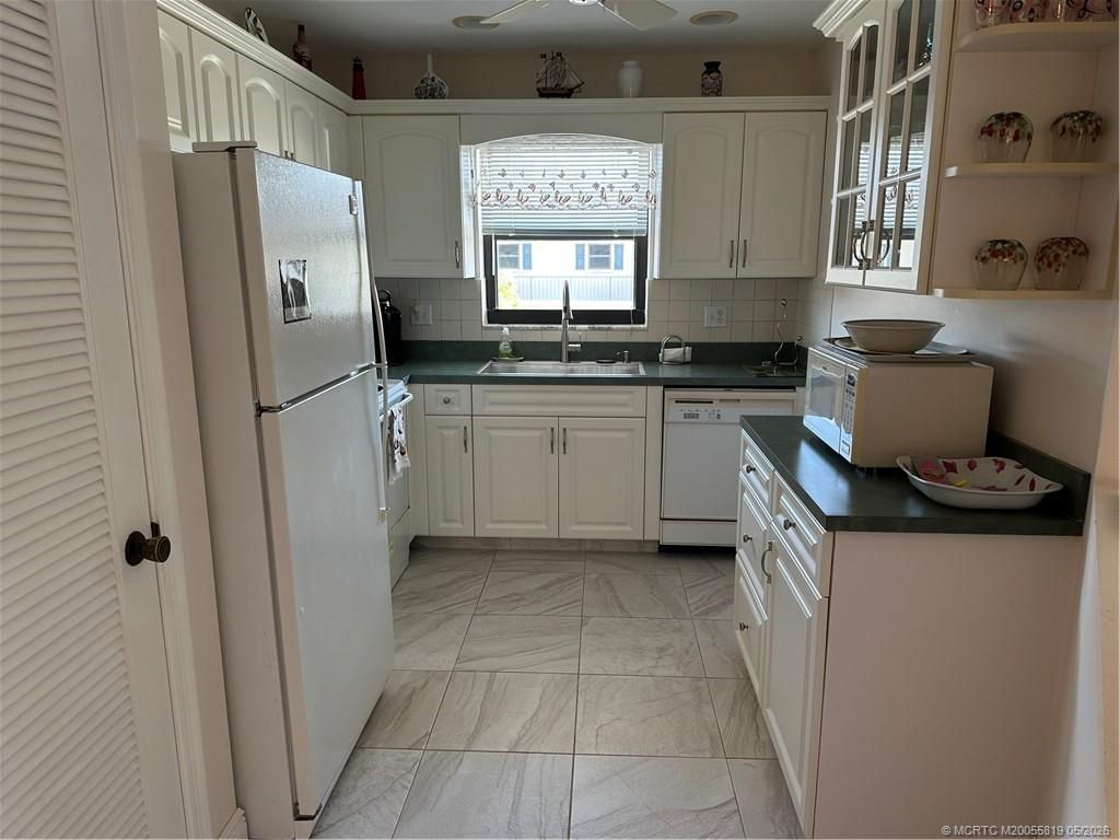 Photo of 755 Saturn Street #F205, Jupiter, FL 33477 (MLS # M20055819)