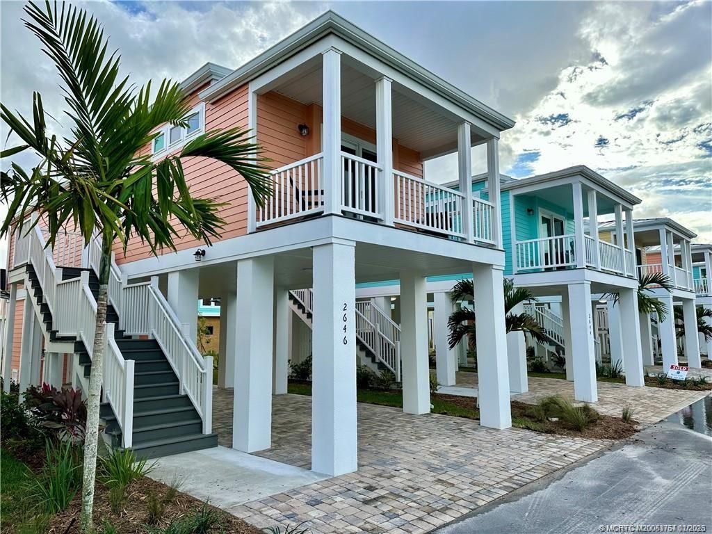 Photo of 2646 NE Pelican Way E, Jensen Beach, FL 34957 (MLS # M20053764)