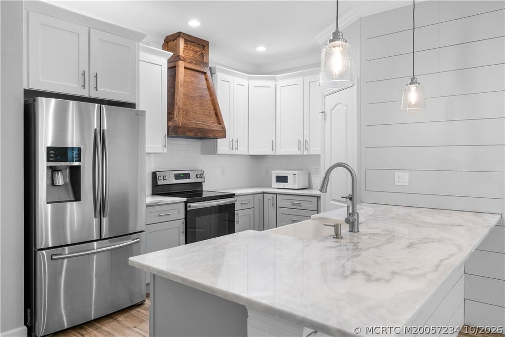 Photo of 3091 SW Otter Lane, Stuart, FL 34997 (MLS # M20057234)
