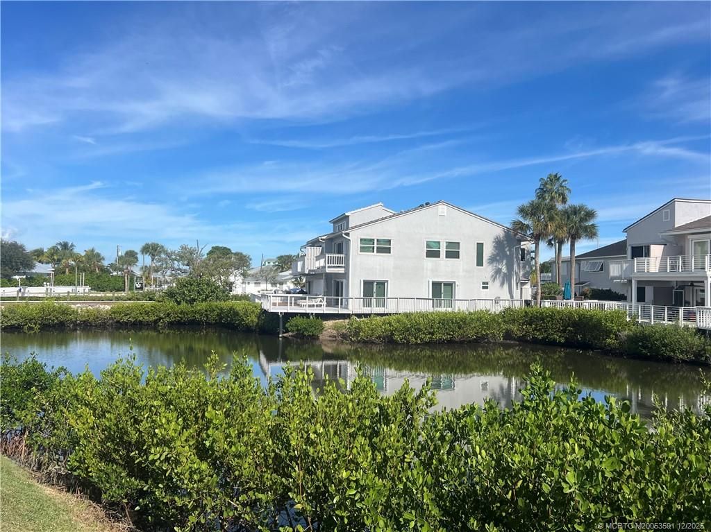 Photo of 2486 Harbour Cove Drive, Hutchinson Island, FL 34949 (MLS # M20053591)