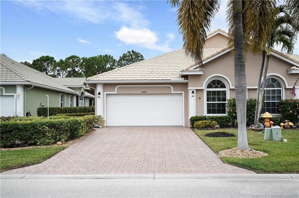 Photo of 600 NW Red Pine Way, Jensen Beach, FL 34957 (MLS # M20048481)