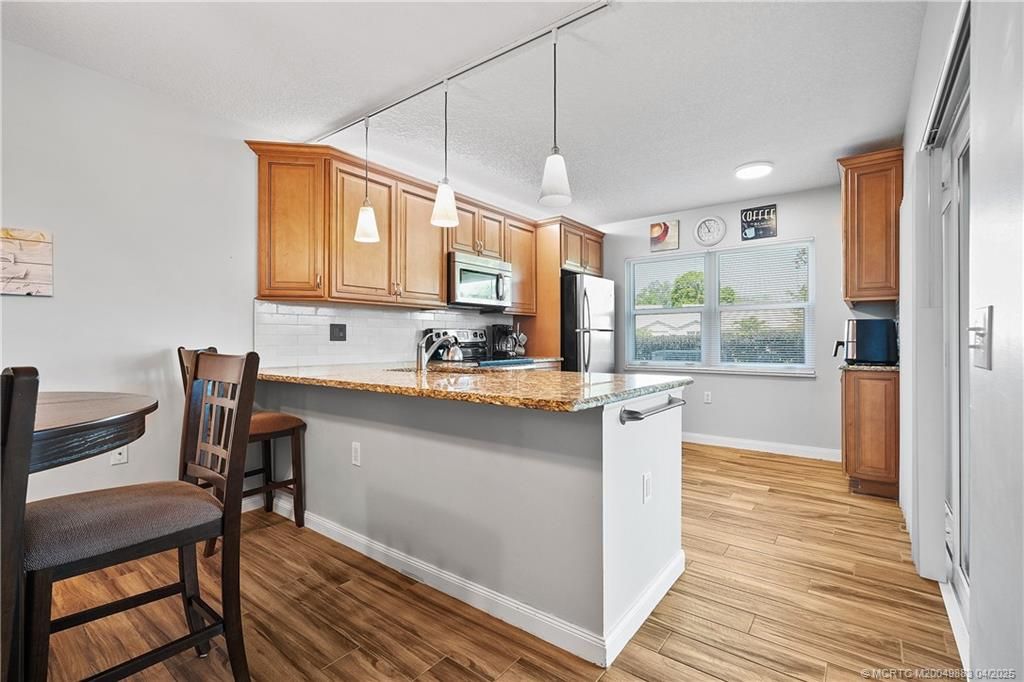 Photo of 3531 SW Sunset Trace Circle, Palm City, FL 34990 (MLS # M20049883)