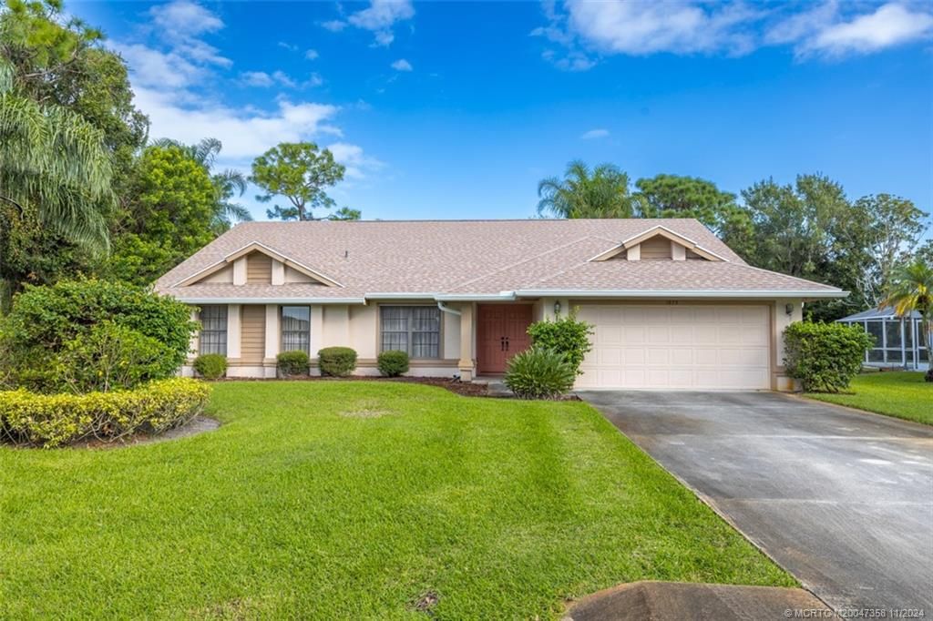 Photo of 1873 SW Hunters Club Way, Palm City, FL 34990 (MLS # M20047358)