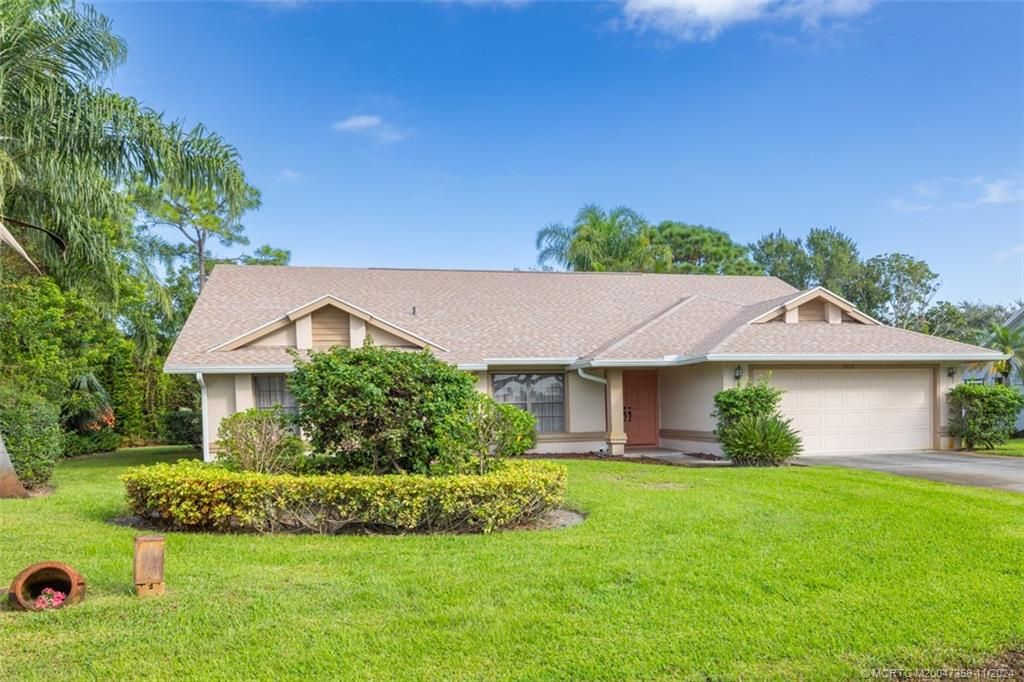 Photo of 1873 SW Hunters Club Way, Palm City, FL 34990 (MLS # M20047358)