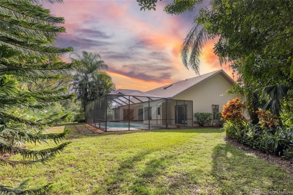 Photo of 1873 SW Hunters Club Way, Palm City, FL 34990 (MLS # M20047358)