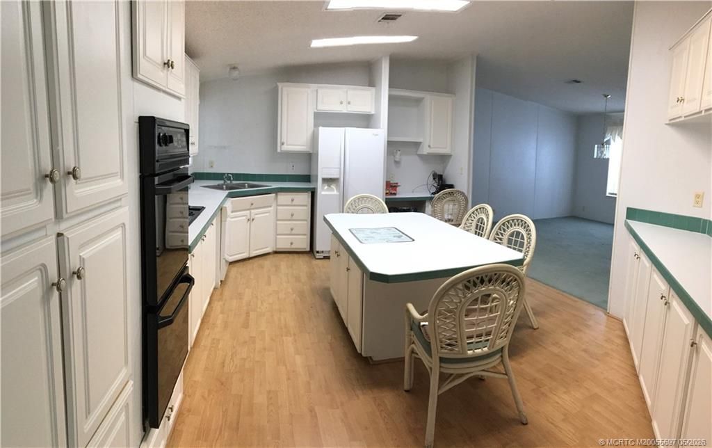 Photo of 16297 SW Indianwood Circle SW #O-24, Indiantown, FL 34956 (MLS # M20055697)