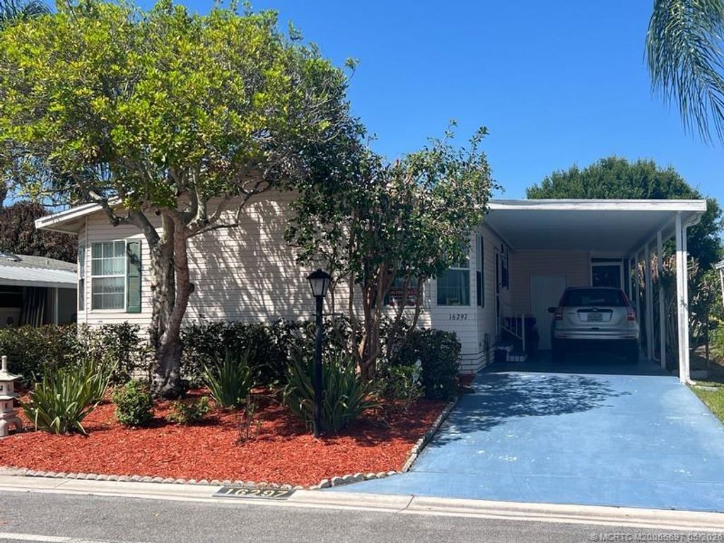 Photo of 16297 SW Indianwood Circle SW #O-24, Indiantown, FL 34956 (MLS # M20055697)