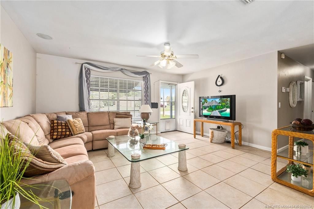 Photo of 425 SW Kentwood Road, Port Saint Lucie, FL 34953 (MLS # M20043435)