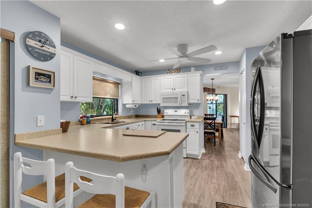 Photo of 5184 SE Schooner Oaks Way, Stuart, FL 34997 (MLS # M20050889)