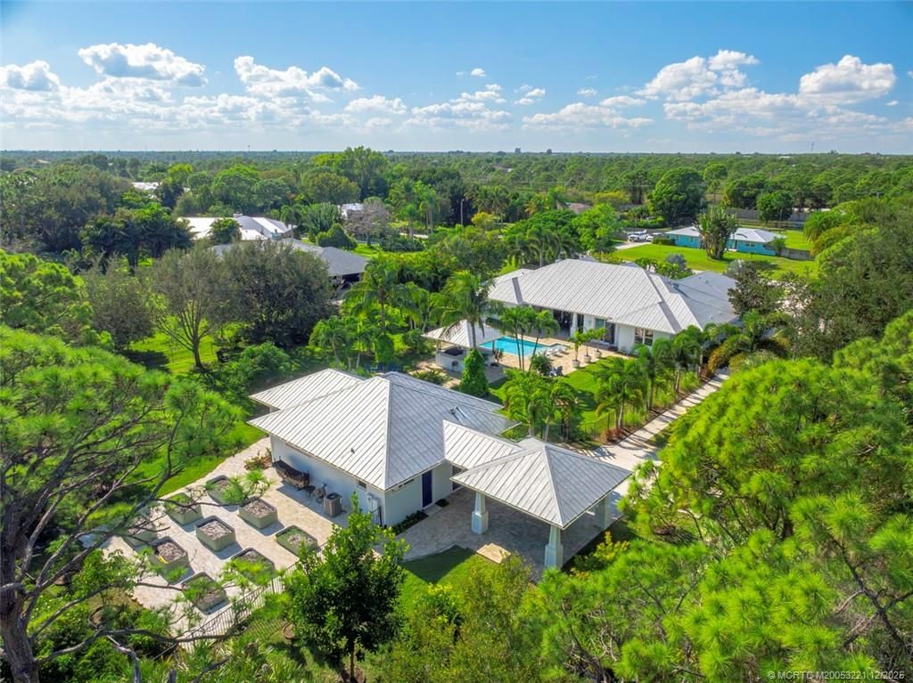 Photo of 2695 NE Cypress Lane, Jensen Beach, FL 34957 (MLS # M20053221)