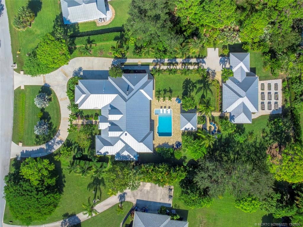 Photo of 2695 NE Cypress Lane, Jensen Beach, FL 34957 (MLS # M20053221)