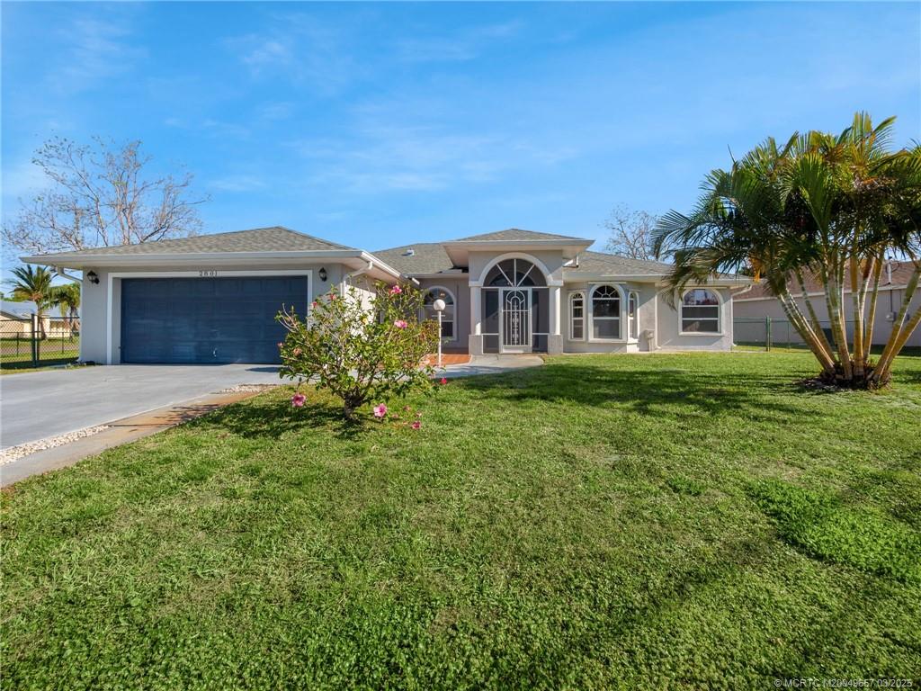 Photo of 2801 SE Hutchings Avenue, Port Saint Lucie, FL 34952 (MLS # M20049657)