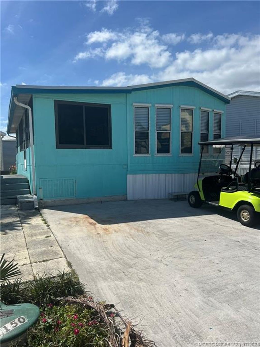 Photo of 1150 Nettles Boulevard, Jensen Beach, FL 34957 (MLS # M20051323)