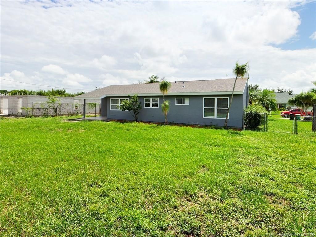 Photo of 161 SW Dalva Avenue, Port Saint Lucie, FL 34984 (MLS # M20040413)