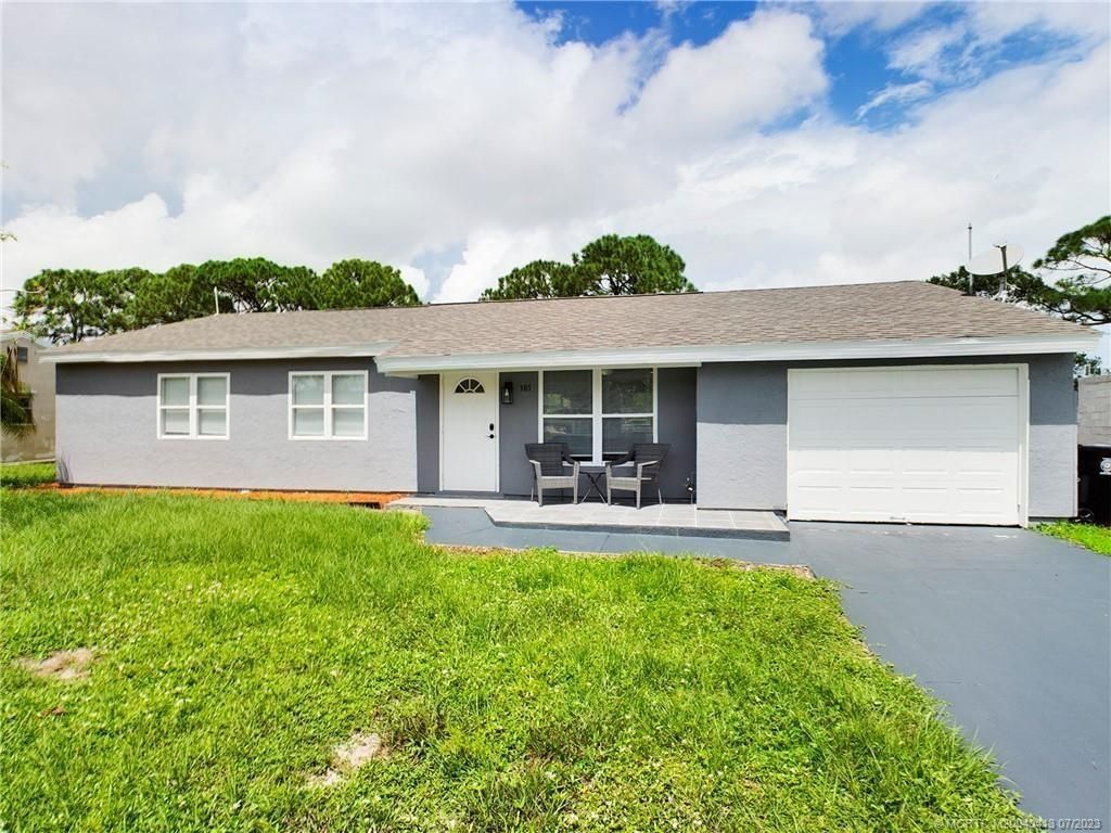 Photo of 161 SW Dalva Avenue, Port Saint Lucie, FL 34984 (MLS # M20040413)