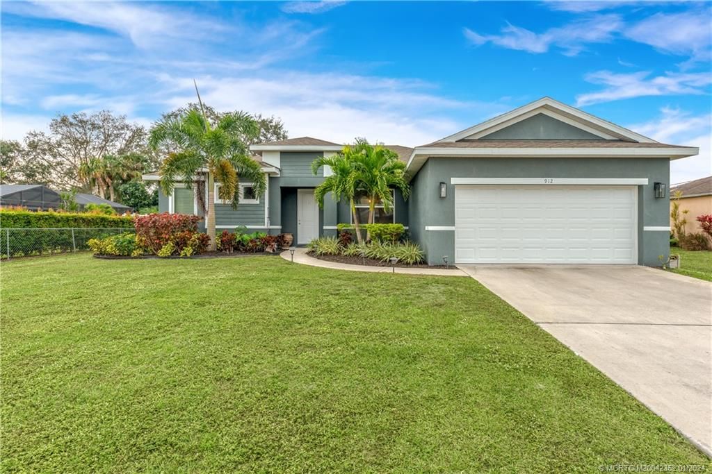 Photo of 912 SW Haleyberry Avenue, Port Saint Lucie, FL 34953 (MLS # M20042352)