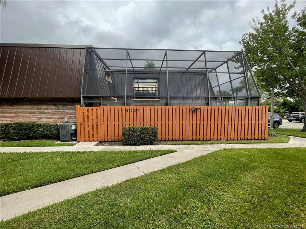 Photo of 6137 SE Windsong Lane SE, Stuart, FL 34997 (MLS # M20041205)