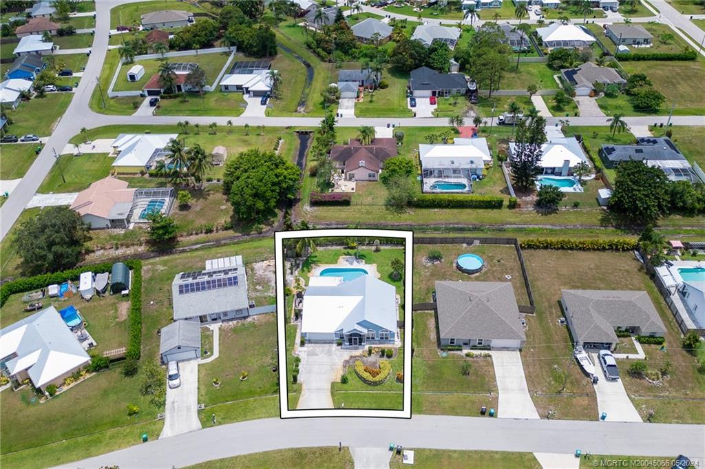 Photo of 2658 SE Dozier Lane, Port Saint Lucie, FL 34952 (MLS # M20045066)