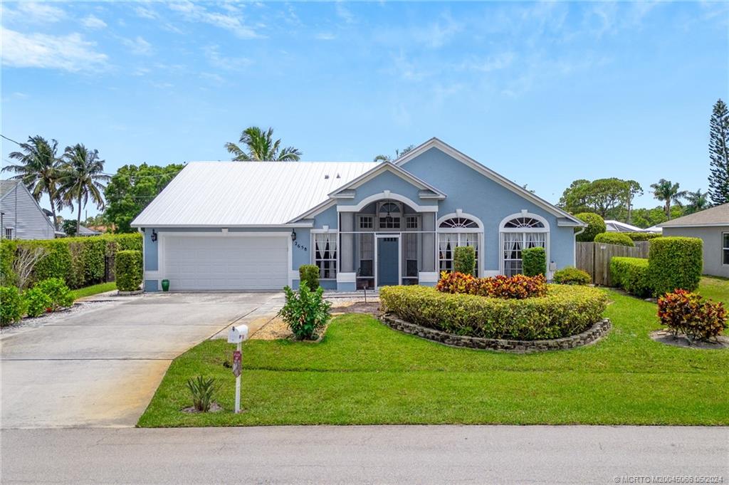 Photo of 2658 SE Dozier Lane, Port Saint Lucie, FL 34952 (MLS # M20045066)