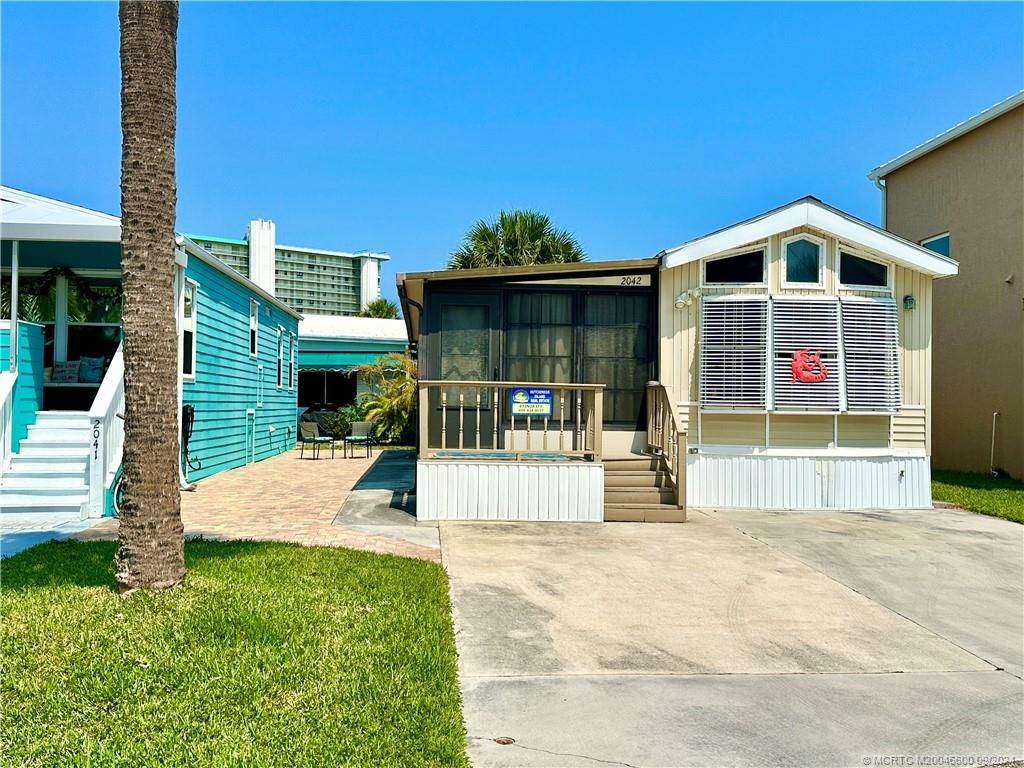 Photo of 2042 Nettles Boulevard, Jensen Beach, FL 34957 (MLS # M20046600)