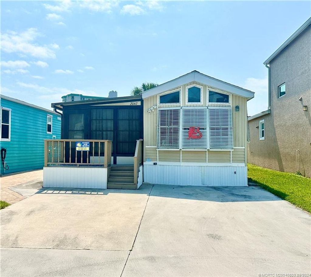 Photo of 2042 Nettles Boulevard, Jensen Beach, FL 34957 (MLS # M20046600)