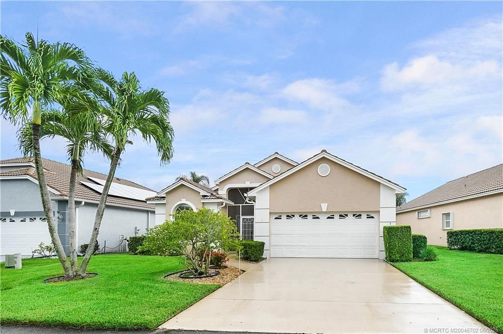 Photo of 825 NW Sorrento Lane, Port Saint Lucie, FL 34986 (MLS # M20046702)