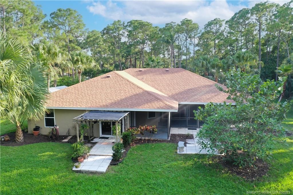 Photo of 10385 157th Street N, Jupiter, FL 33478 (MLS # M20041377)