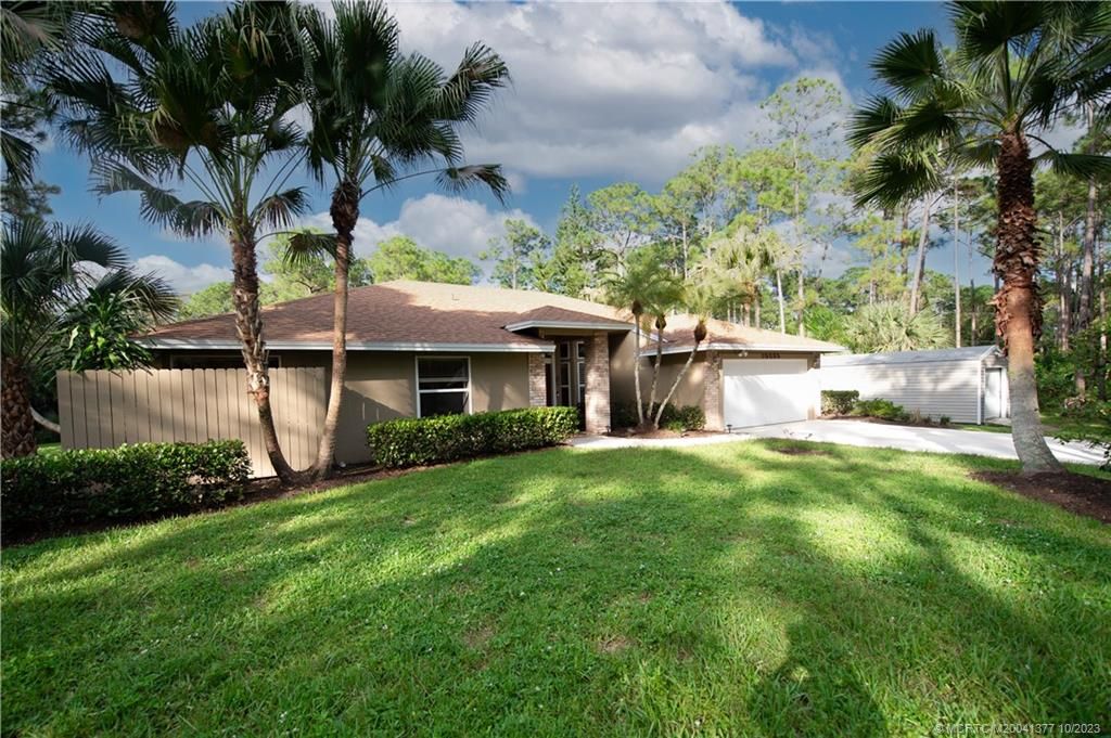 Photo of 10385 157th Street N, Jupiter, FL 33478 (MLS # M20041377)