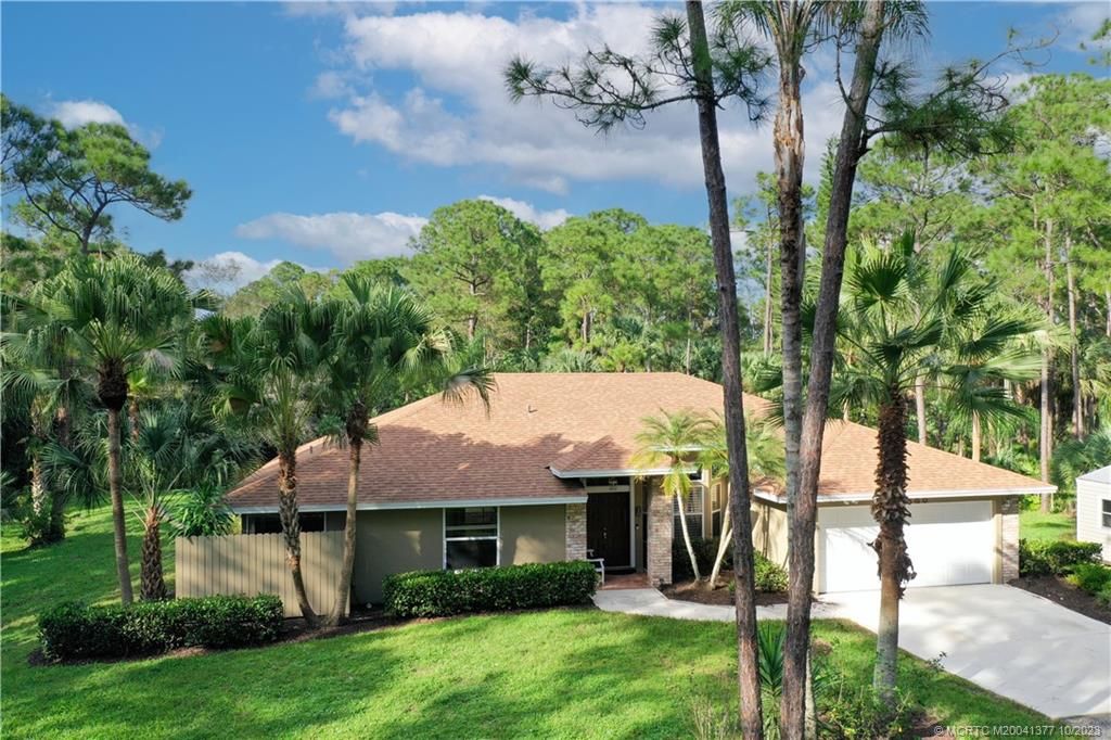 Photo of 10385 157th Street N, Jupiter, FL 33478 (MLS # M20041377)