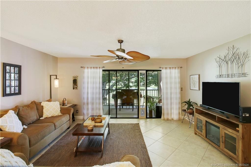 Photo of 12870 Briarlake Drive #204, Palm Beach Gardens, FL 33418 (MLS # M20044140)