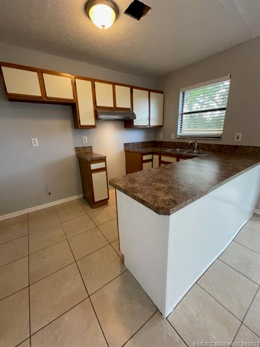 Photo of 5043 SE Primrose Way, Stuart, FL 34997 (MLS # M20040937)
