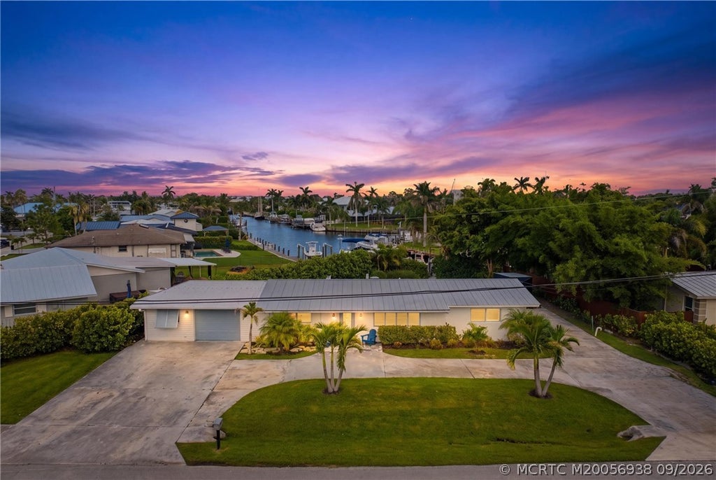 Photo of 387 SW Riverway Boulevard, Palm City, FL 34990 (MLS # M20056938)