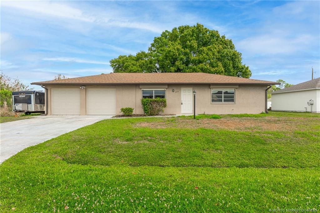 Photo of 549 SW Buswell Avenue, Port Saint Lucie, FL 34983 (MLS # M20055133)
