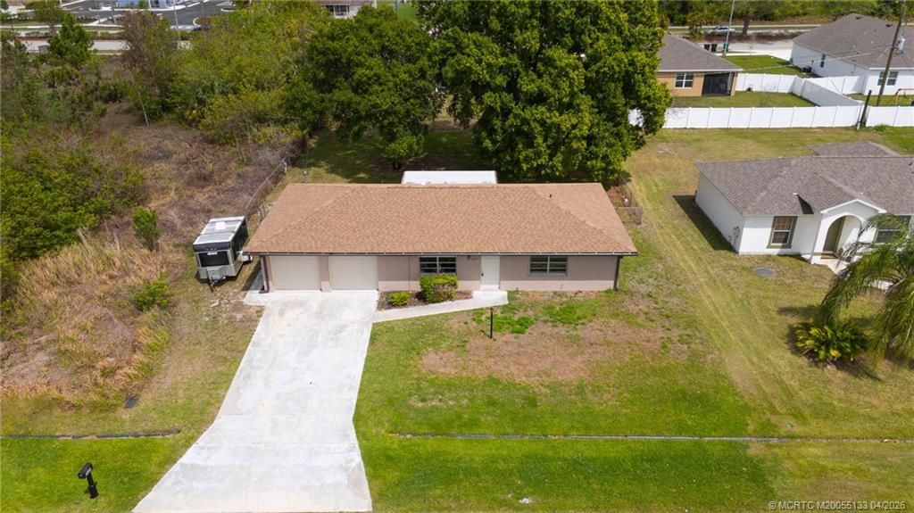 Photo of 549 SW Buswell Avenue, Port Saint Lucie, FL 34983 (MLS # M20055133)