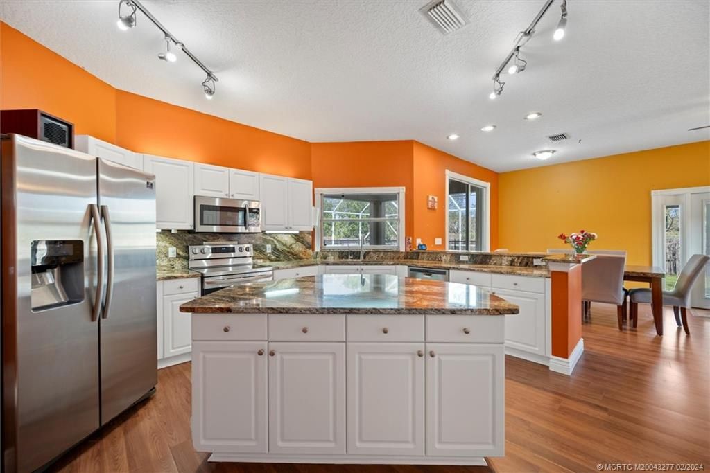 Photo of 1225 SW Janette Avenue, Port Saint Lucie, FL 34953 (MLS # M20043277)